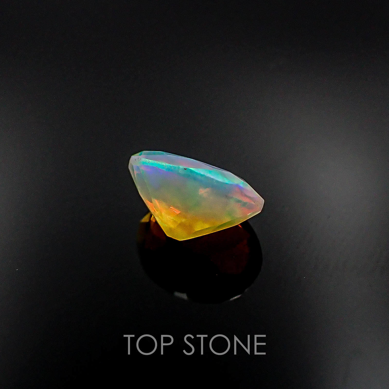 オパール卸売 エチオピアンオパール エチオピア産 ルース 0.78ct[20062778]8.1×6.2mm